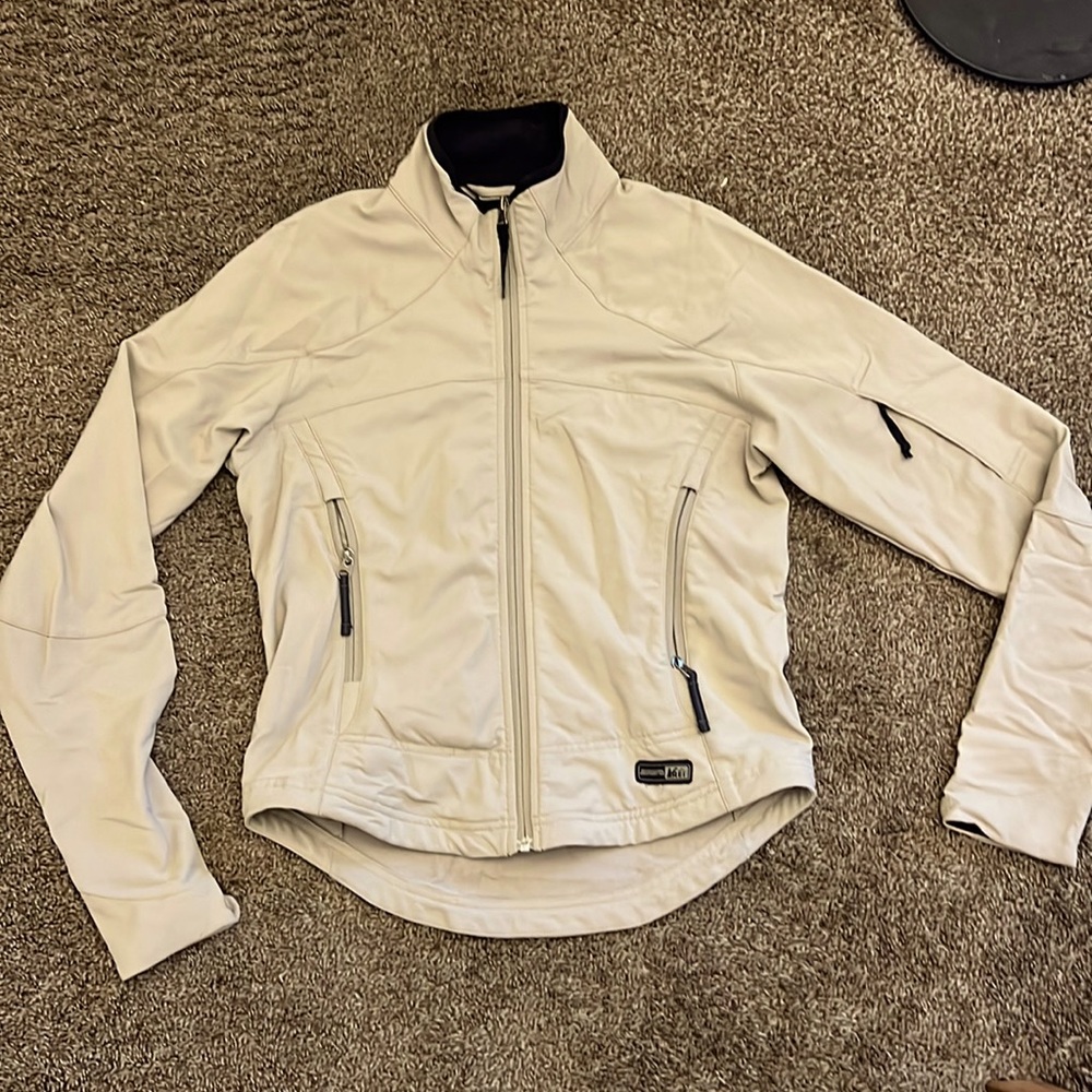 REI tan light jacket women’s small
